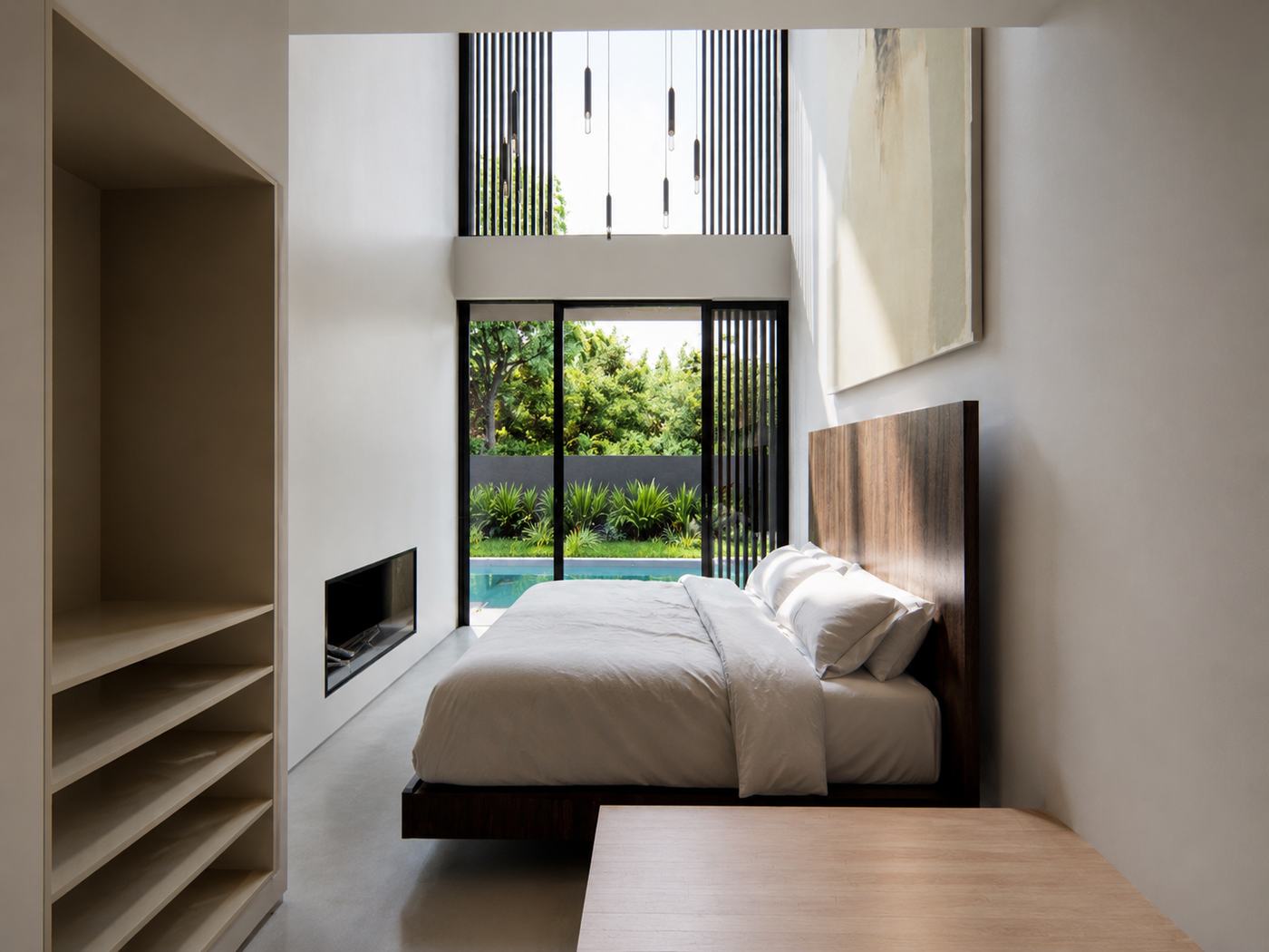 Casa X — Dormitorio chimenea piscina