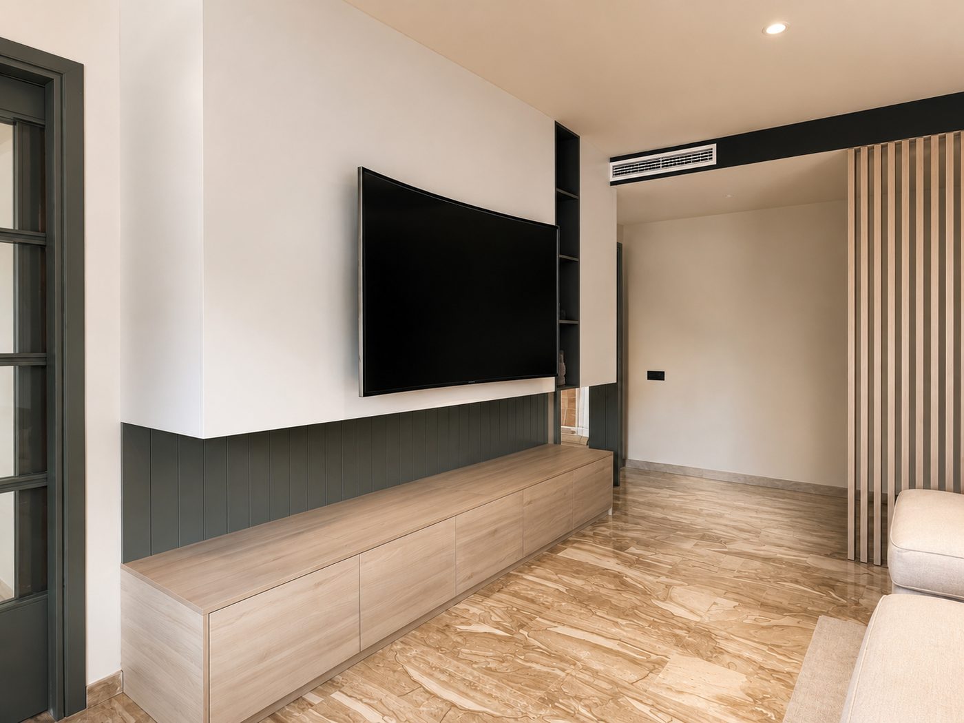 Reforma Casa Tramunta — Salón tv piedra